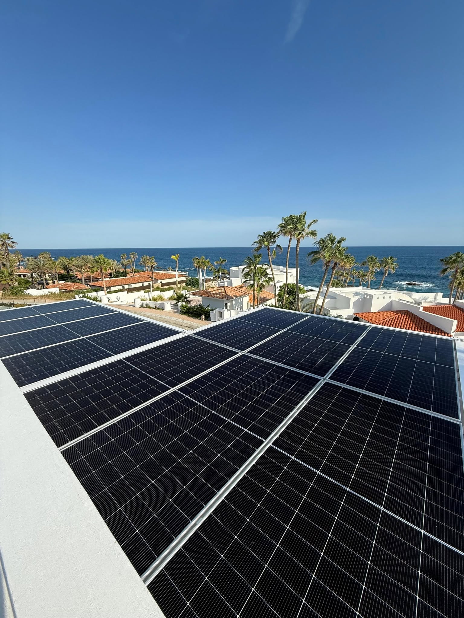 Rooftop solar panels with ocean view