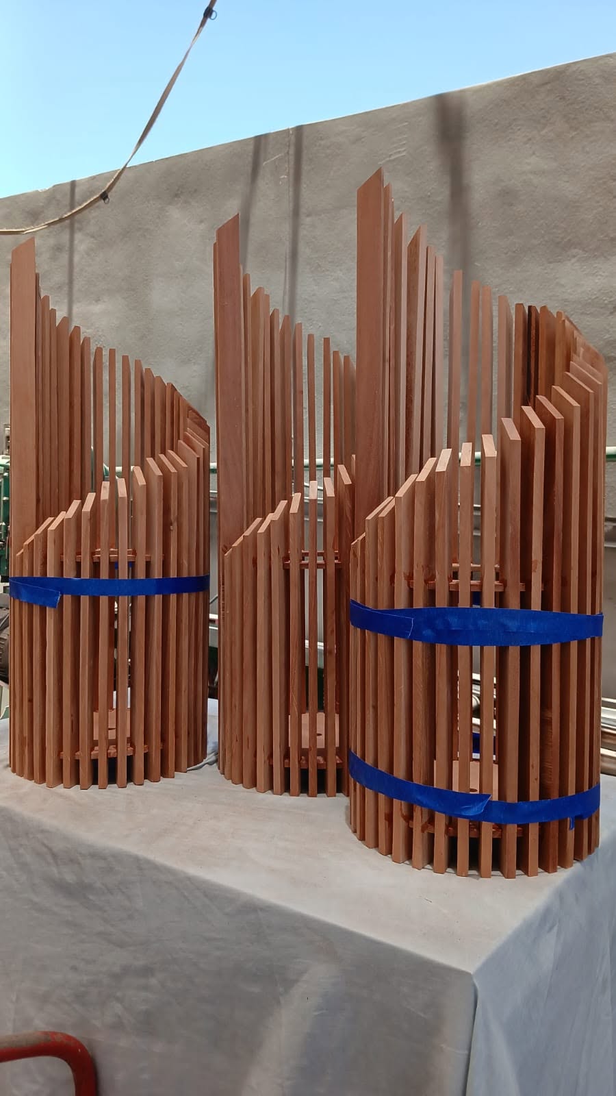 Curved wood slat structures